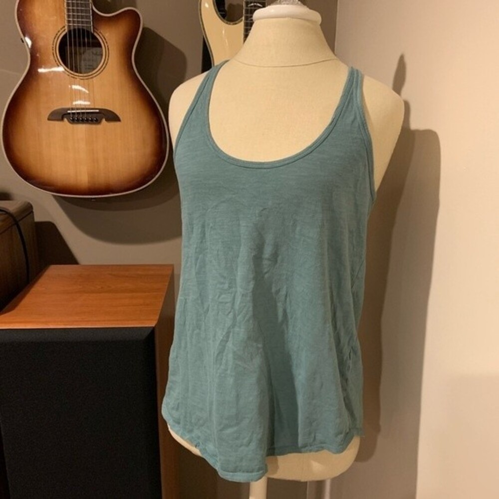 Cotton On size medium sea green racer back tank top. You have found the one